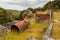 Remains in the landscape of an old mining factory in the ghost town of Waiuta, New Zealand