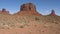 Remains Of Red Sandstone Rock Formations In Monument Valley Usa