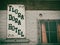 Remains of sign on long closed Fora Dora Hotel a remnant from 1800`s gold mining era
