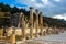 Remains of State Agora colonnade on background of Odeon in Ephesus