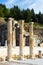 Remains of State Agora colonnade on background of Odeon in Ephesus