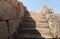 Remains  of well-preserved stone steps in the ruins of the outer part of the palace of King Herod - Herodion,in the Judean Desert