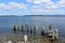 The remains of a wooden pier on the Bras D`or lakes at Marble Mountain beach