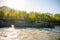 Remarkable natural objects - dragon teeth - in Katun river of Altai mountains with beautiful taiga area on background