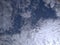 A remarkable snapshot of an eye-catching view of a pattern of clusters of white clouds in blue sky