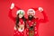 Remember these moments. happy father and daughter love xmas. little girl and dad santa hat. daddy and kid red background