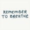 Remember to breathe - handwritten with a marker quote.