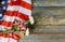 Remembrance pink carnation flowers on American flag for Memorial Day