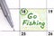 Reminder Go Fishing in calendar with pen