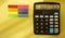 REMINDER text on calculator with colorful stickers