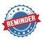 REMINDER text on red blue ribbon stamp