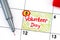 Reminder Volunteer Day in calendar with pen