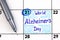 Reminder World Alzheimer`s Day in calendar with pen