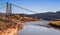 Remnants of Dewey Suspension Bridge Crossing the Colorado, Moab, Utah