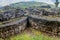 Remnants of round houses in Kuelap, ruined citadel city of Chachapoyas cloud forest culture in mountains of northern Per