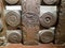 The remnants of a stone pillar with carvings from the ancient Bharhut Stupa in the