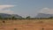 Remote Arid Barren African Landscape with Mountains in Distance