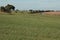 Remote Barn In Middle Of Field 