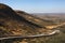 Remote desert road through Damaraland in Namibia