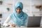 Remote Entrepreneurship. Black Islamic Businesslady Using Smartphone While Working At Home Office