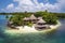 remote island getaway with luxurious beach villa, private pool, and butler service