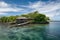 remote island hideaway, surrounded by warm waters and crystal clear skies