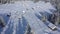 Remote mountain village, homestead in the mountains covered by snow at winter. Aerial drone view