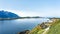 Remote scenic view on Sandnessjoen town and The Seven Sisters Mountain, sea port. Alsta Island, Norway