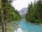 A remote turquoise river feeding into Kinney Lake, deep in the wilderness of the Rockies