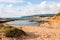 Remote wild beach with cliffs and rocks inside the Mediterranean Sea in North Israel near Rosh Hanikra