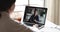 Remote worker video conference calling indian manager on laptop screen