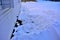 Remove snow from furnace exhaust after snow storms