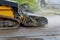 Removing old asphalt from a street surface road milling machine