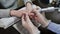 Removing old cover. Woman`s hands at manicure procedures