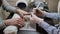 Removing old cover. Woman`s hands at manicure procedures