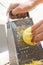 Removing the zest from the lemon. an ingredient for delicious dishes