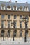 Renaissance building with street lamps in Paris