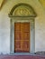 Renaissance door in the cloister of Basilica di Santa Croce. Florence, Italy