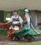 Renaissance Fair Dancers in costume with full skirts