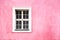 Renaissance style window on pink wall color