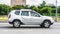 Renault Duster 4x4 AT SUV car on the city road. Silver color compact SUV driving on Moscow street