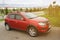 Renault Sandero Stepway parked on the country road.