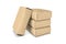 Rendering of four light beige cement sacks isolated on a white background