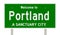 Rendering of highway sign for sanctuary city Portland