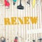 Renew against tools on wooden background