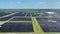 Renewable electricity with zero emission. Sustainable electric power plant with many rows of solar photovoltaic panels