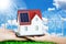 Renewable energy future for domestic consumption concept with miniature house