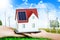 Renewable energy future for domestic consumption concept with miniature house and natural sources of energy