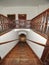 Renewal brown wooden oak staircase with railing in same paint