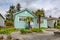 Renovated family house with decorative palm trees at the entrance